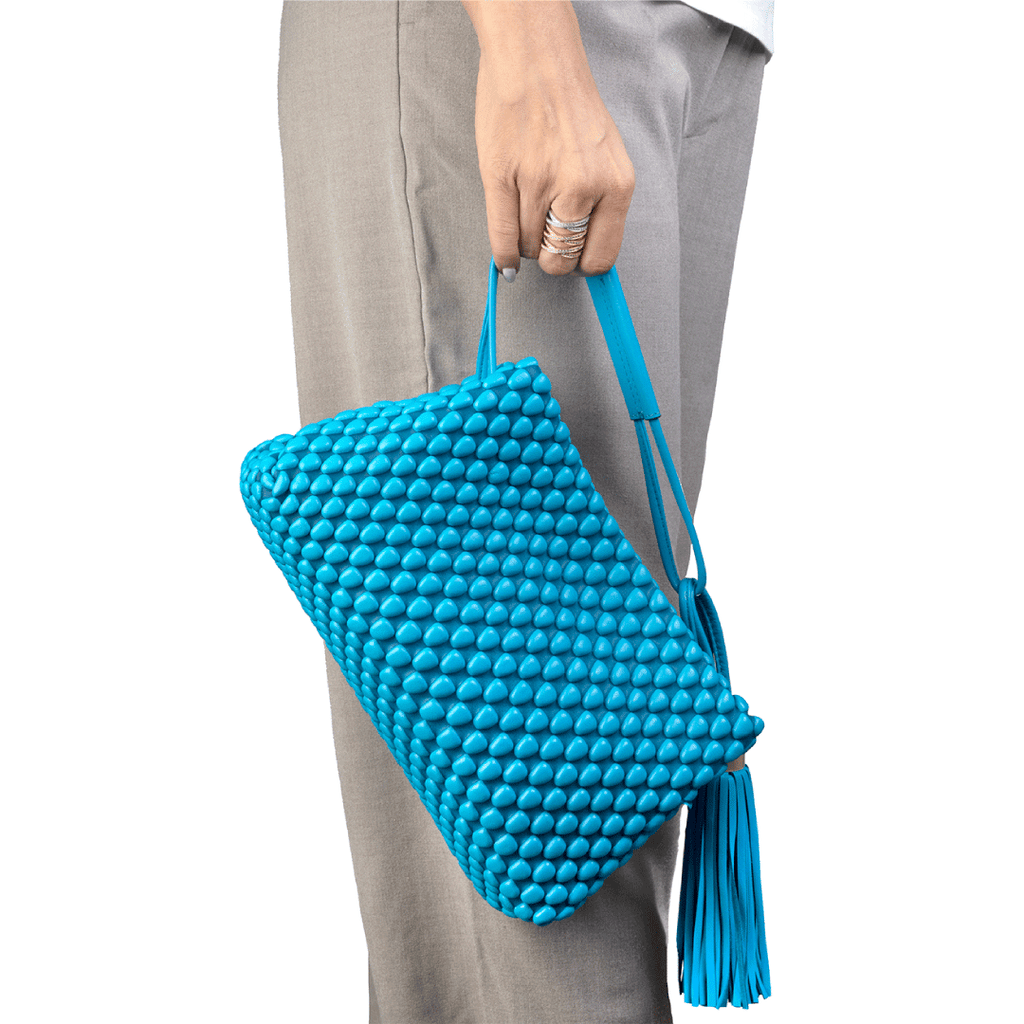 A three-way use bag. Could be an evening clutch or bag. Can also be used as a brunch crossbody bag. Made of Spanish Nappa Leather