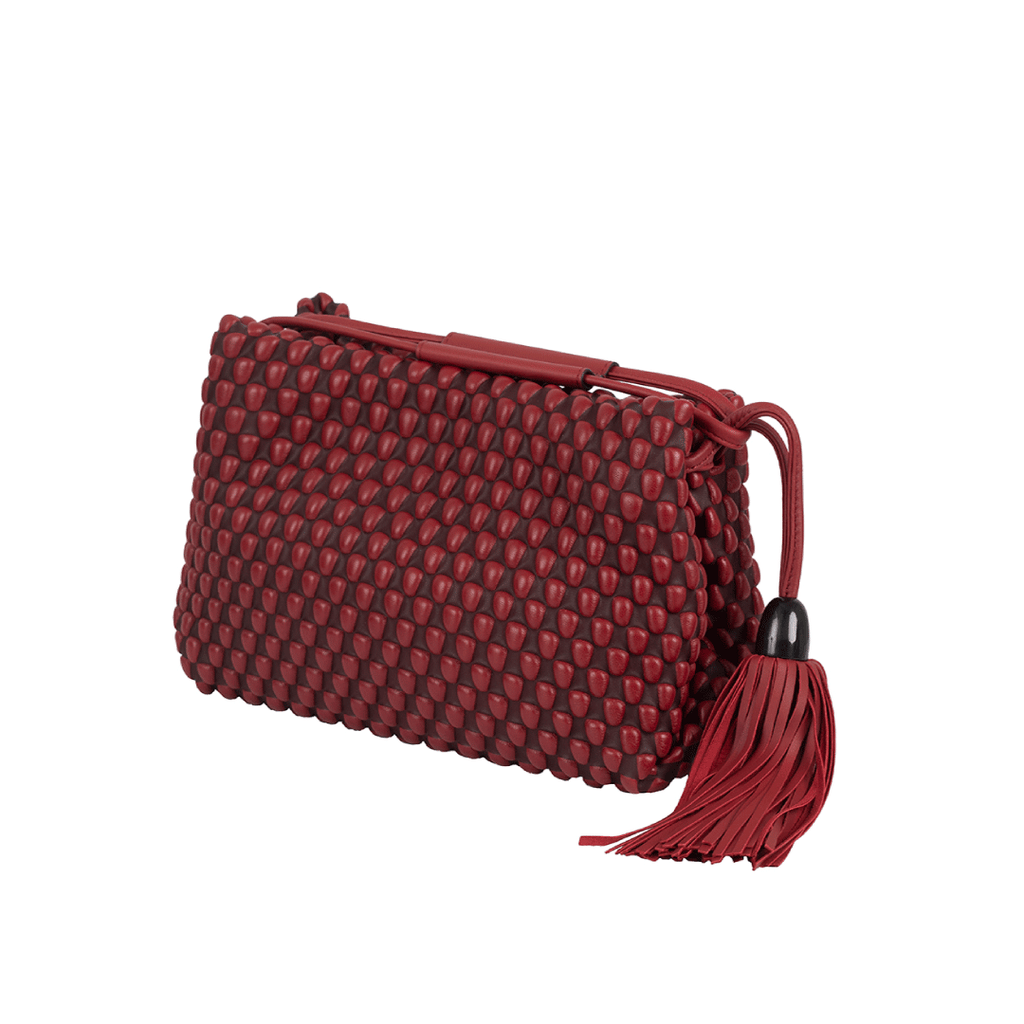 A three-way use bag. Could be an evening clutch or bag. Can also be used as a brunch crossbody bag. Made of Spanish Nappa Leather