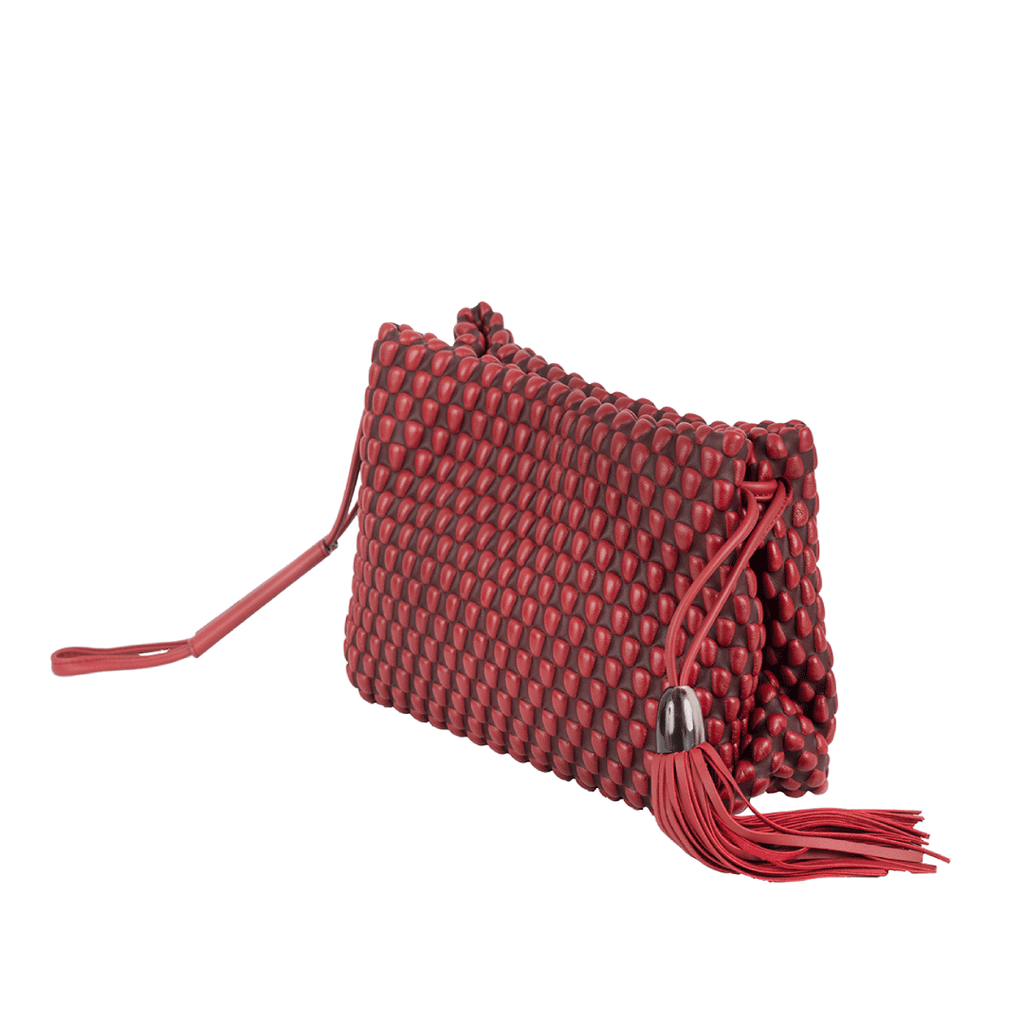 A three-way use bag. Could be an evening clutch or bag. Can also be used as a brunch crossbody bag. Made of Spanish Nappa Leather