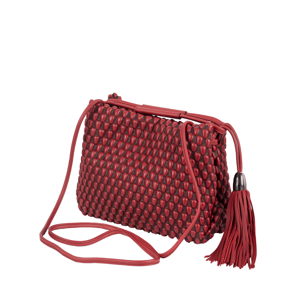 A three-way use bag. Could be an evening clutch or bag. Can also be used as a brunch crossbody bag. Made of Spanish Nappa Leather