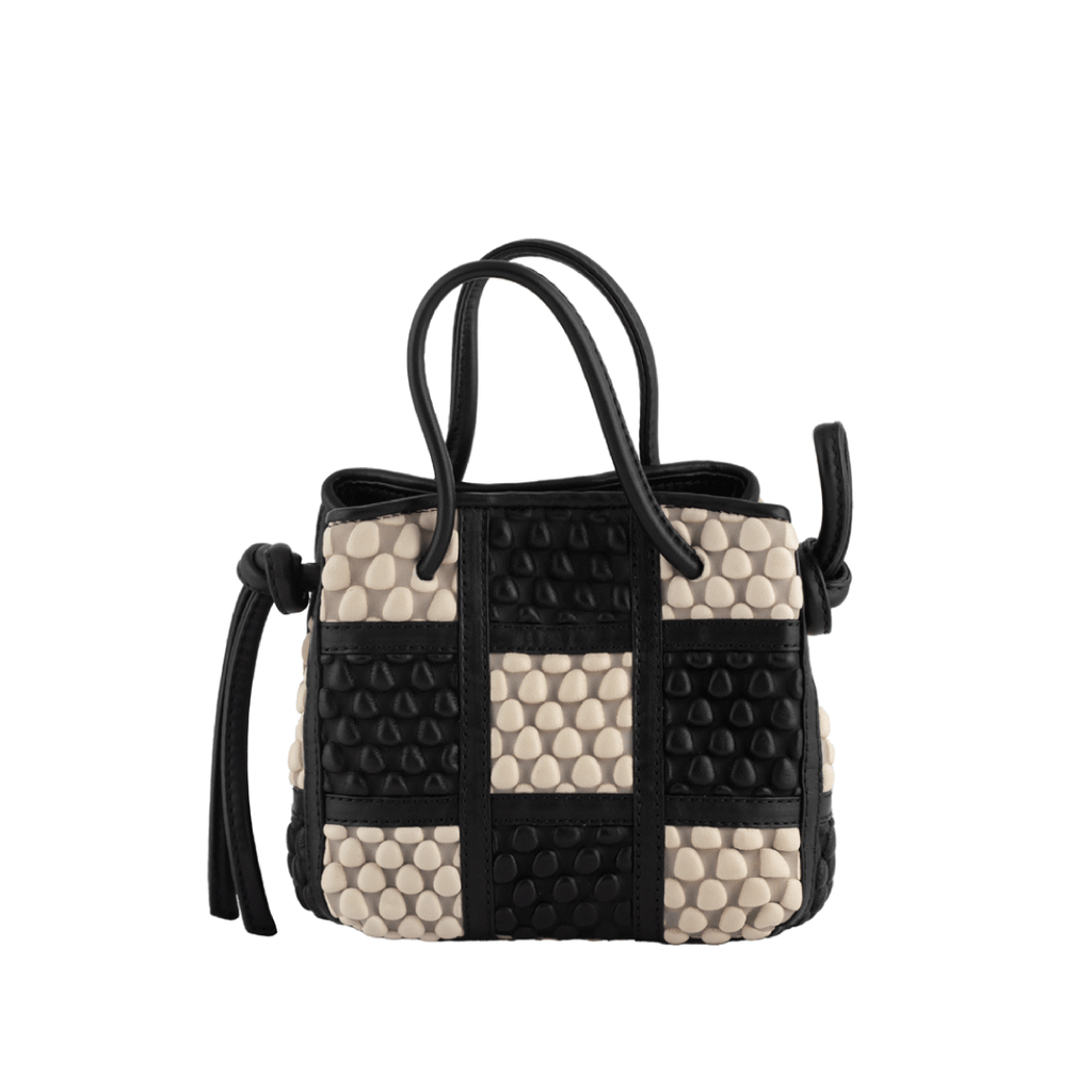 A Spanish Nappa Leather mini patchwork bag which can be also used as a crossbody