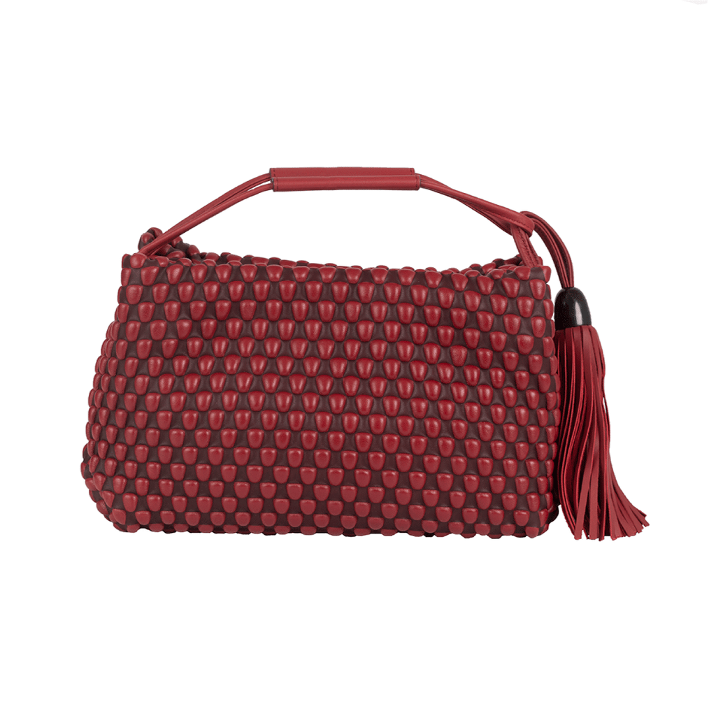 A three-way use bag. Could be an evening clutch or bag. Can also be used as a brunch crossbody bag. Made of Spanish Nappa Leather