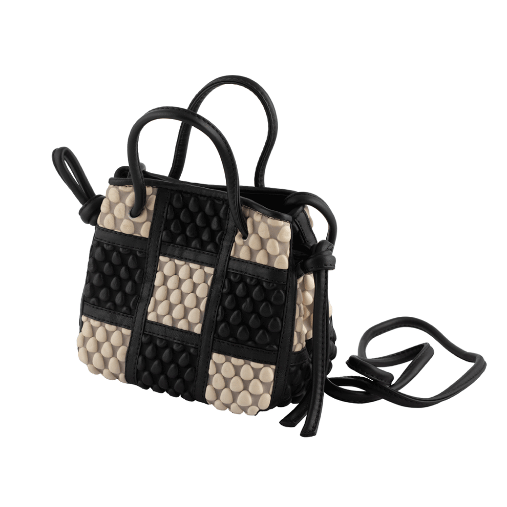 A Spanish Nappa Leather mini patchwork bag which can be also used as a crossbody