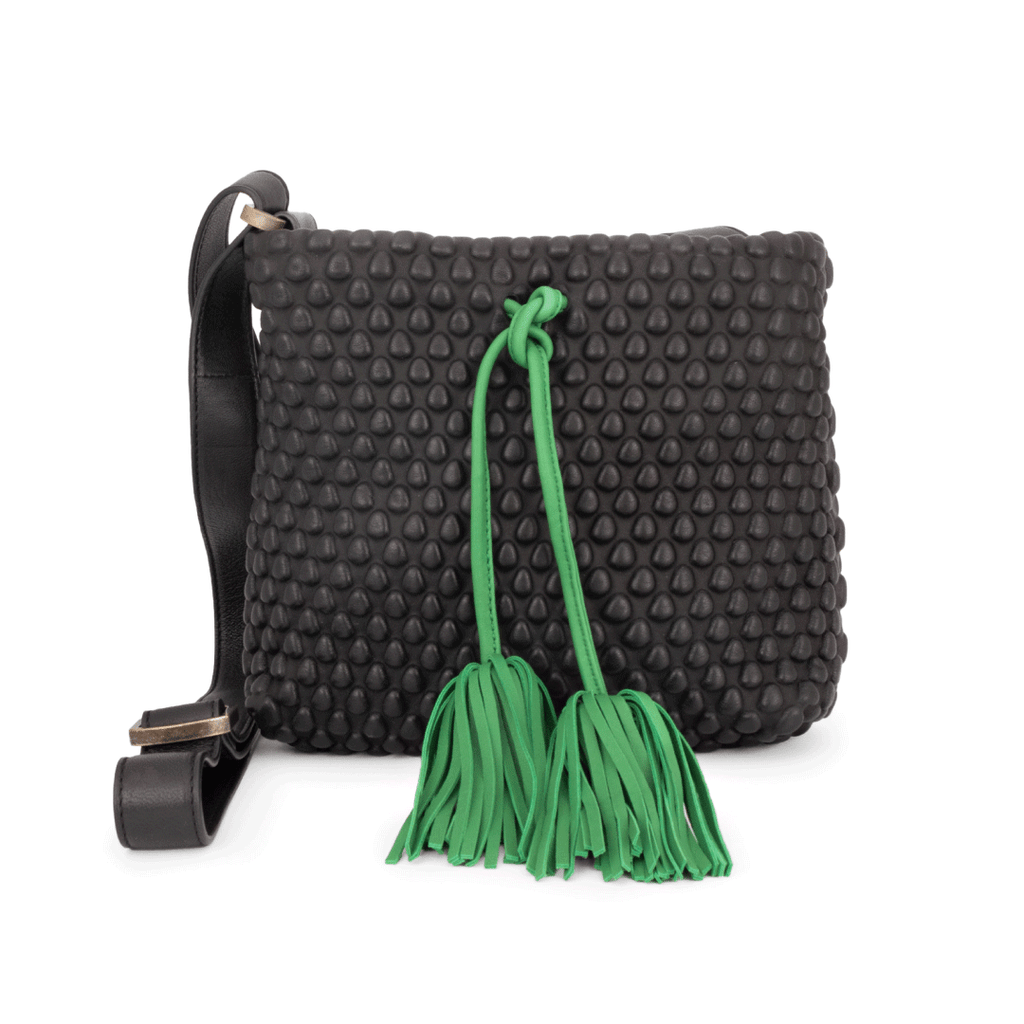 A Spanish Nappa Leather medium sized crossbody leather bag with tassel detailing & adjustable crossbody