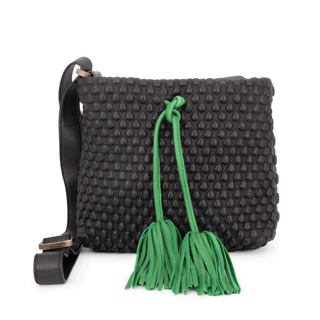 A Spanish Nappa Leather medium sized crossbody leather bag with tassel detailing & adjustable crossbody