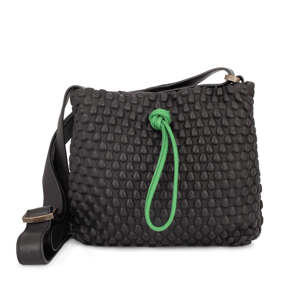 A Spanish Nappa Leather medium sized crossbody leather bag with tassel detailing & adjustable crossbody