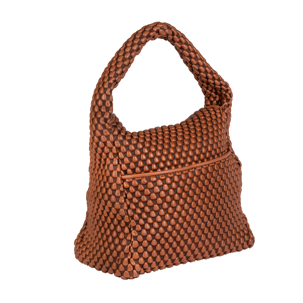 A foldover leather handbag with horn detailing. Perfect for an everyday bag. Made of Spanish Nappa Leather