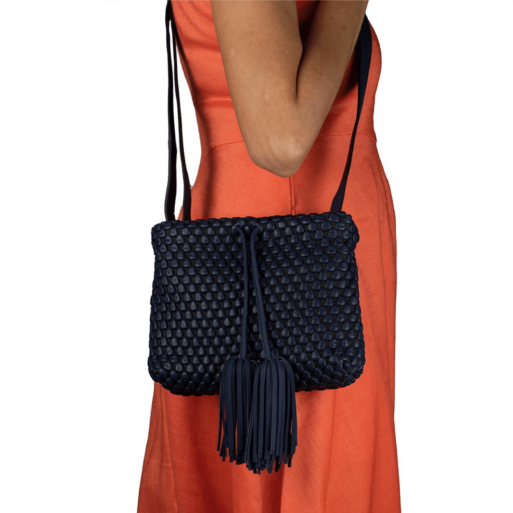 A Spanish Nappa Leather medium sized crossbody leather bag with tassel detailing & adjustable crossbody